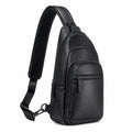 Sac à bandoulière 18 x 8 x 32 cm en similicuir noir à compartiments zippés