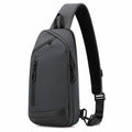 Sac bandoulière 18 x 8 x 32 cm noir en textile synthétique style urbain avec poches zippées