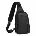 Sac bandoulière 18 x 8 x 32 cm noir en similicuir avec poches zippées